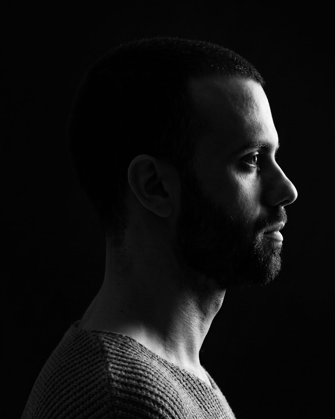 Enso, founder of Sound Pro Academy — black-and-white profile portrait.